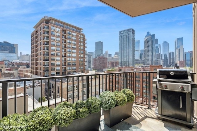 balcony featuring grilling area and a view of city