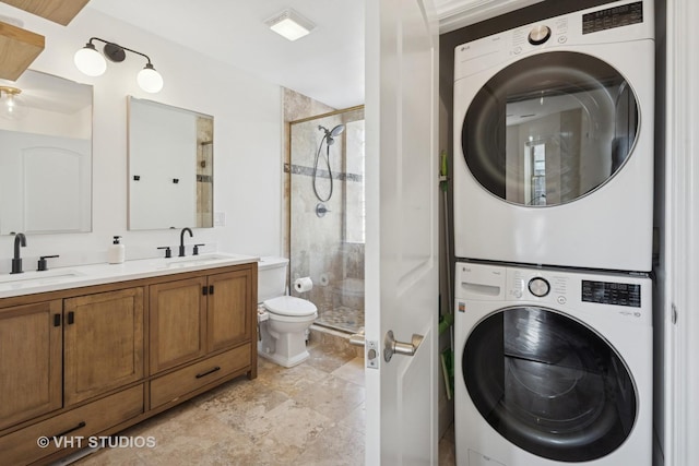 bathroom featuring tiled shower / bath combo, toilet, and vanity