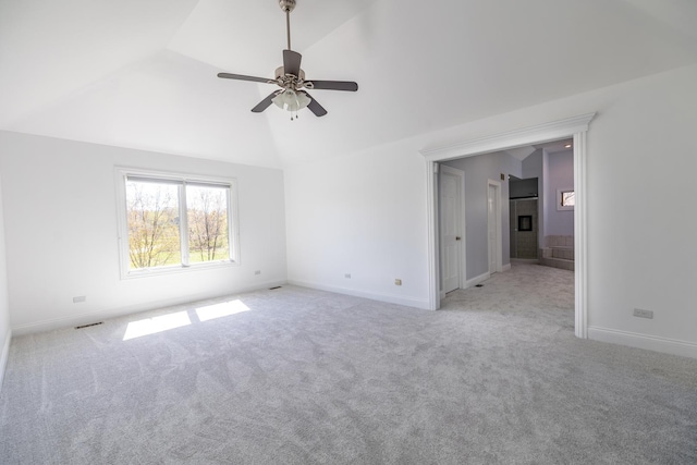 4N481 Citation Ln, Elburn, IL 60119 - empty room with baseboards, ceiling fan, carpet flooring, and vaulted ceiling