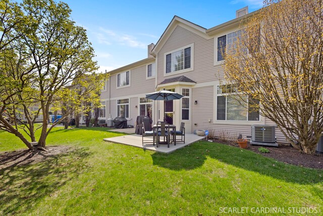 3307 Rosecroft Ln, Naperville, IL 60564 - back of property featuring a chimney, central AC, a patio, and a lawn