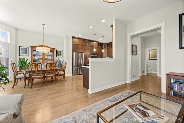 3307 Rosecroft Ln, Naperville, IL 60564 - living room featuring light wood finished floors, baseboards, and recessed lighting