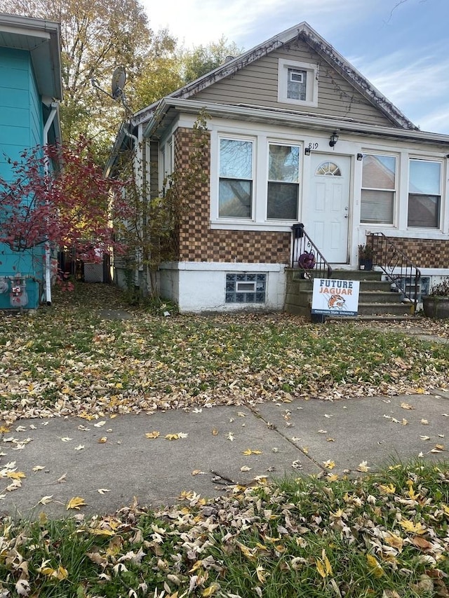 view of front of property with entry steps