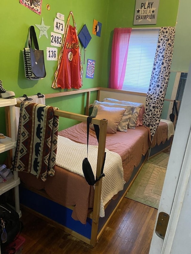 bedroom featuring hardwood / wood-style flooring