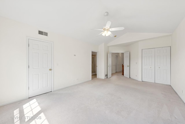2505 Camberley Cir Unit 3-813, Westchester, IL 60154 - unfurnished bedroom with light carpet, lofted ceiling, and ceiling fan