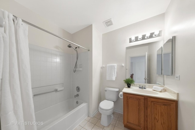 2505 Camberley Cir Unit 3-813, Westchester, IL 60154 - bathroom featuring tile patterned floors, shower / bath combo, toilet, and vanity