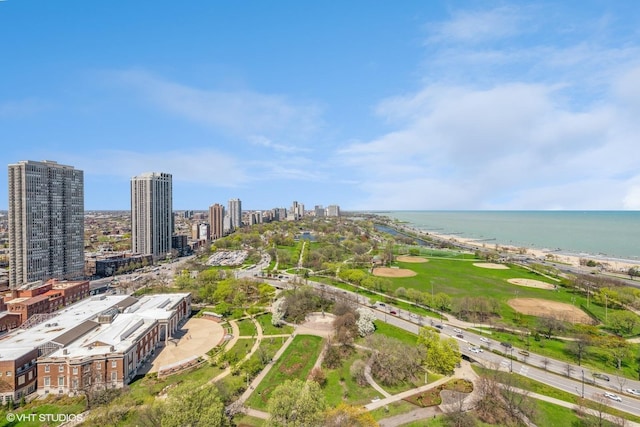 drone / aerial view with a view of city and a water view