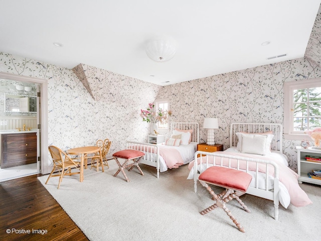 180 De Windt Rd, Winnetka, IL 60093 - bedroom featuring wallpapered walls, wood finished floors, and visible vents