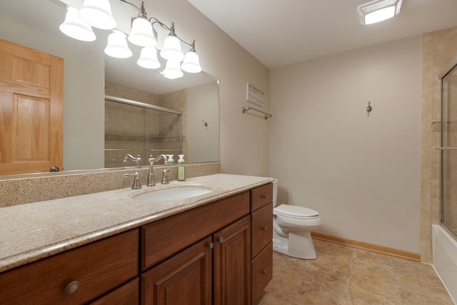 bathroom featuring vanity, toilet, and tile patterned flooring