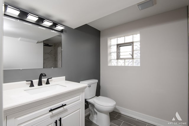 10945 S Neenah Ave, Worth, IL 60482 - full bath with vanity, a shower, baseboards, toilet, and visible vents