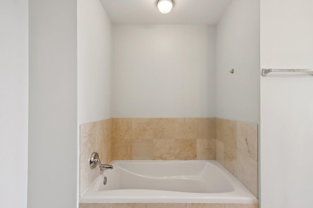 full bath with a garden tub