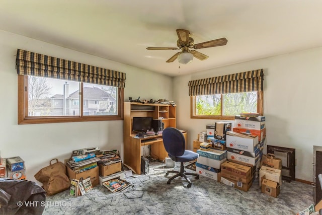 office space featuring carpet flooring and ceiling fan