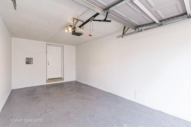 7923 163rd Ct Unit 23, Tinley Park, IL 60477 - garage with a garage door opener and baseboards
