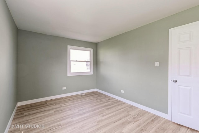 7923 163rd Ct Unit 23, Tinley Park, IL 60477 - empty room with light wood-style floors and baseboards