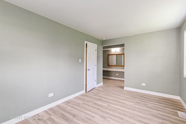 7923 163rd Ct Unit 23, Tinley Park, IL 60477 - empty room with baseboards and light wood-style flooring