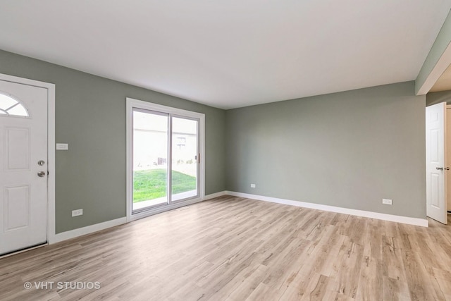 7923 163rd Ct Unit 23, Tinley Park, IL 60477 - entrance foyer featuring light wood-style floors and baseboards