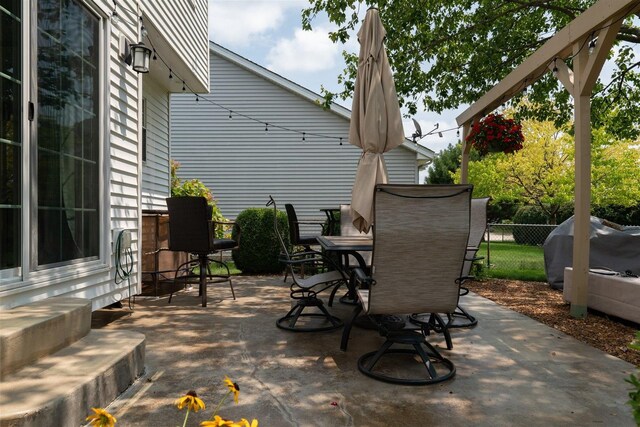 view of patio / terrace with fence