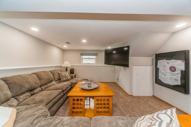 living area featuring carpet flooring, visible vents, baseboards, recessed lighting, and lofted ceiling