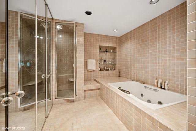 1250 Westmoor Rd, Winnetka, IL 60093 - bathroom featuring tile walls, a jetted tub, a stall shower, recessed lighting, and tile patterned floors