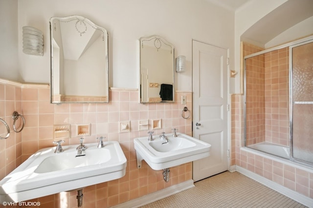 1250 Westmoor Rd, Winnetka, IL 60093 - full bathroom with a sink, tiled shower / bath, tile patterned floors, and tile walls