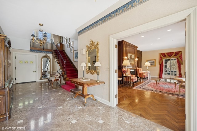 1250 Westmoor Rd, Winnetka, IL 60093 - foyer with baseboards, stairway, a chandelier, and recessed lighting