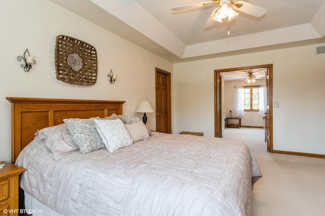 13 W Royal Oaks Dr, Bristol, IL 60512 - bedroom with light carpet, a raised ceiling, baseboards, and a ceiling fan