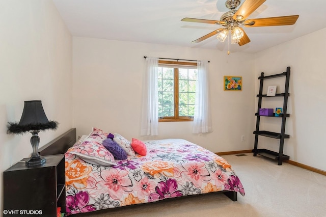 13 W Royal Oaks Dr, Bristol, IL 60512 - carpeted bedroom featuring baseboards and ceiling fan