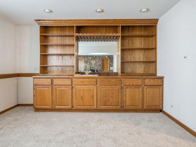 bar featuring light colored carpet, baseboards, and recessed lighting
