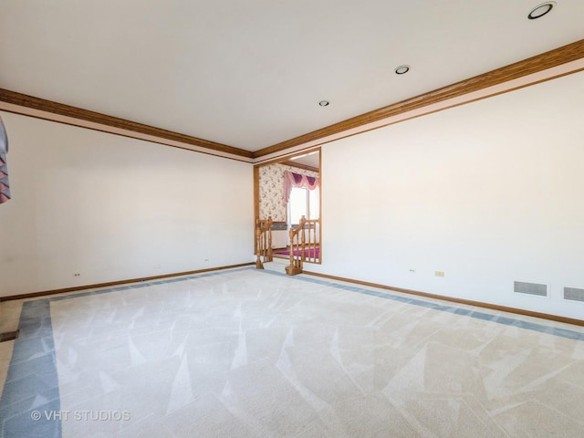 unfurnished room with recessed lighting, carpet floors, crown molding, and baseboards