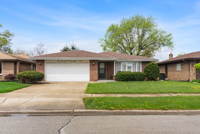 17148 William St, Lansing, IL 60438 - ranch-style house featuring brick siding, a front yard, driveway, and an attached garage