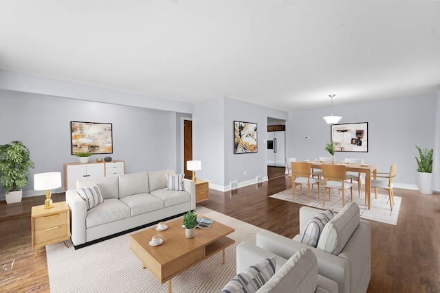 17148 William St, Lansing, IL 60438 - living area with wood finished floors and baseboards
