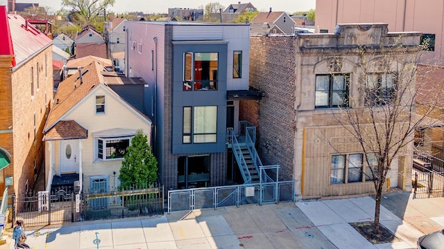 2143 W 19th St Unit 3, Chicago, IL 60608 - view of building exterior with stairs and fence