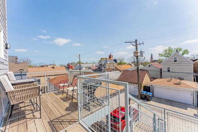2143 W 19th St Unit 3, Chicago, IL 60608 - wooden deck with a residential view