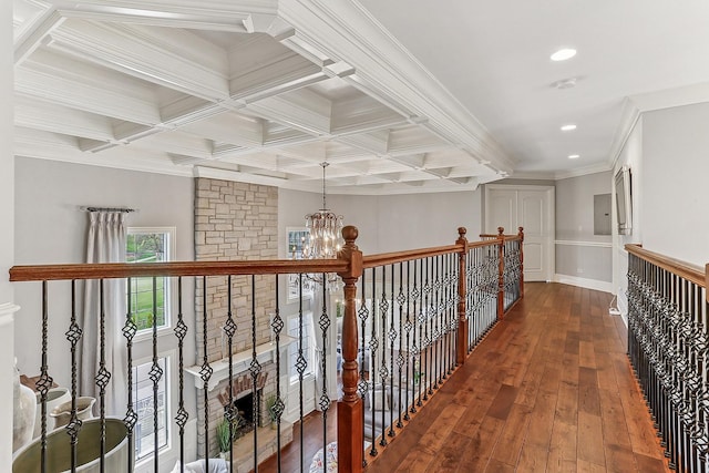 corridor with beam ceiling, dark wood-style floors, a chandelier, recessed lighting, and wainscoting