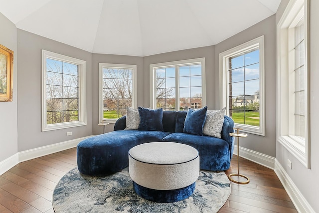 sunroom with vaulted ceiling and plenty of natural light