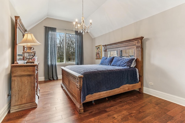 bedroom featuring lofted ceiling, dark wood finished floors, a chandelier, and baseboards