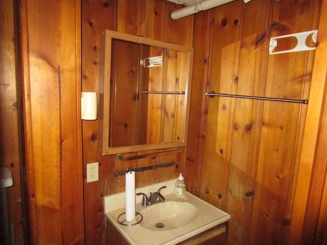 9201 S Marshfield Ave, Chicago, IL 60620 - bathroom featuring wood walls and vanity