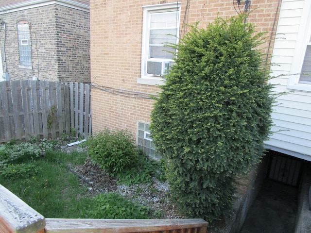 9201 S Marshfield Ave, Chicago, IL 60620 - view of home's exterior with fence and brick siding