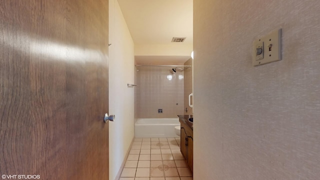 full bathroom with tile patterned floors, visible vents, toilet, vanity, and tub / shower combination