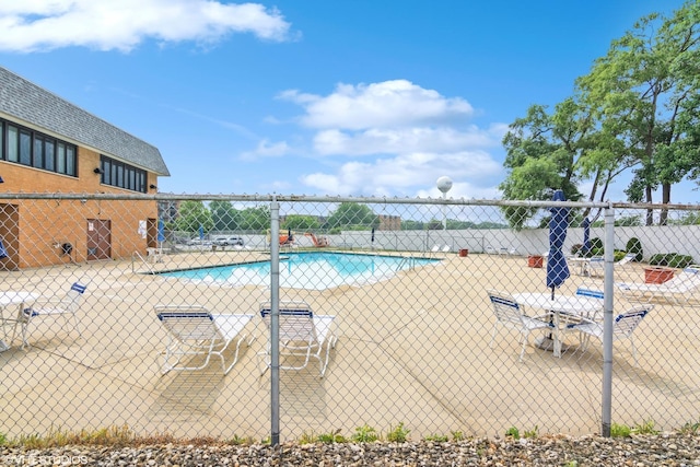 pool featuring fence
