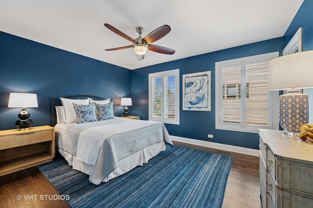 3118 Oliver Ln, Northbrook, IL 60062 - bedroom featuring baseboards, wood finished floors, and ceiling fan