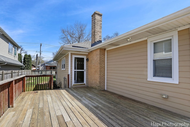 wooden deck featuring fence