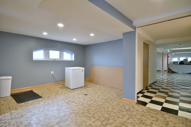laundry area with recessed lighting, tile patterned floors, and baseboards