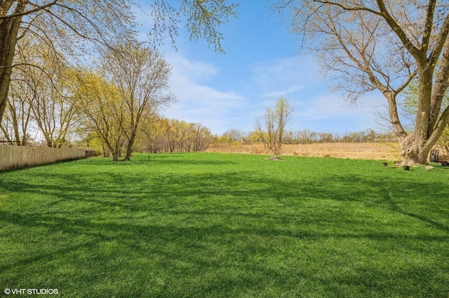 view of yard featuring fence