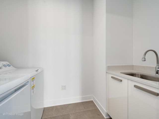 403 N Wabash Ave Unit 13B, Chicago, IL 60611 - laundry area featuring independent washer and dryer, cabinet space, and tile patterned flooring