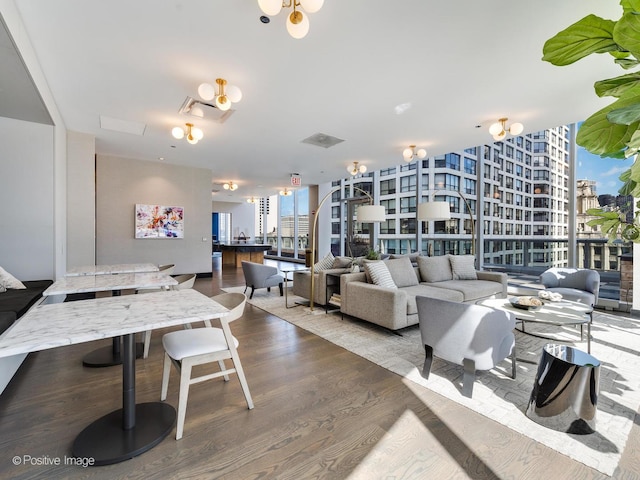 403 N Wabash Ave Unit 13B, Chicago, IL 60611 - living room with dark wood-style floors and a wall of windows