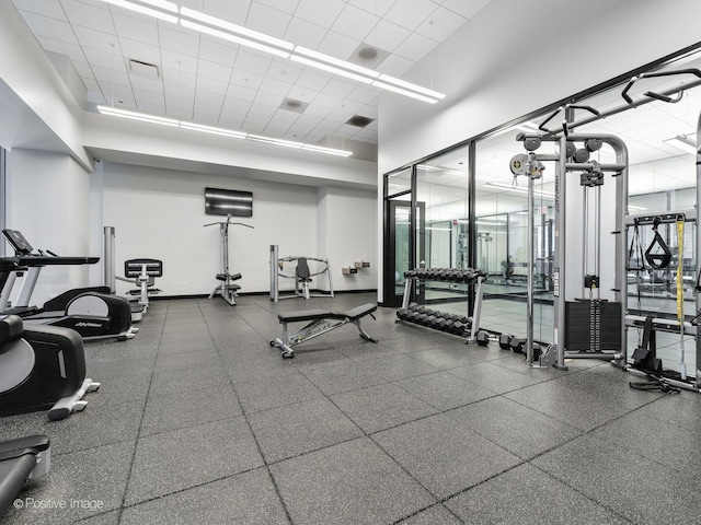 403 N Wabash Ave Unit 13B, Chicago, IL 60611 - exercise room featuring a paneled ceiling and a high ceiling
