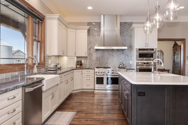 14431 E 2400 N Rd, Hudson, IL 61748 - kitchen featuring island range hood, stainless steel appliances, a sink, dark wood-style floors, and white cabinets