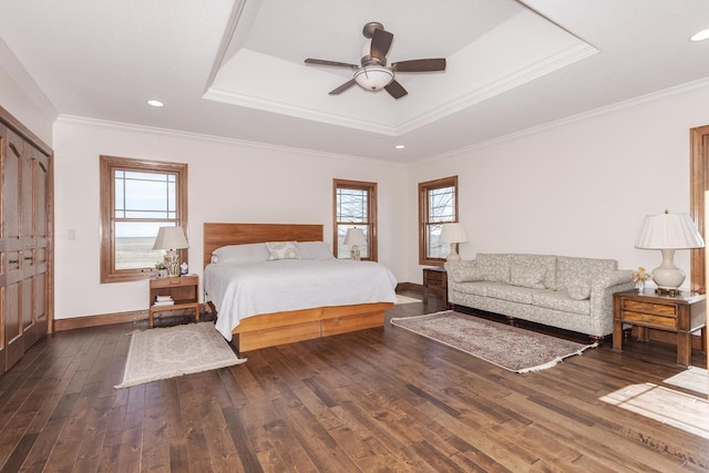 14431 E 2400 N Rd, Hudson, IL 61748 - bedroom with a raised ceiling, multiple windows, hardwood / wood-style floors, baseboards, and ornamental molding
