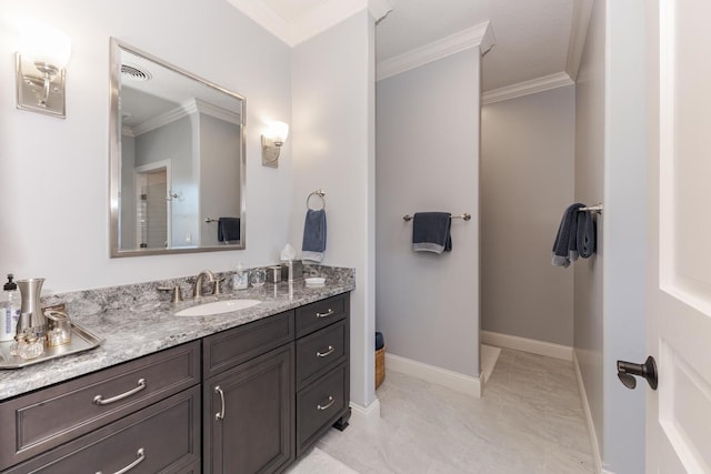 14431 E 2400 N Rd, Hudson, IL 61748 - full bath featuring crown molding, vanity, baseboards, and marble look tiles