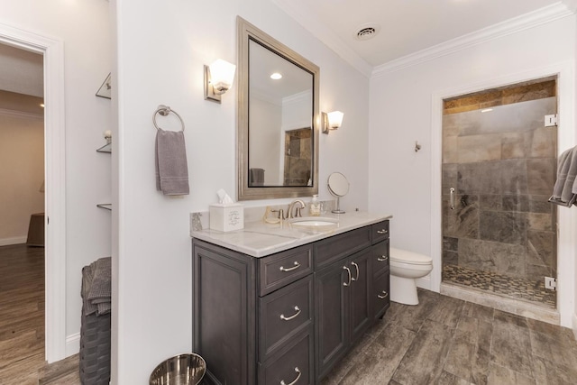 14431 E 2400 N Rd, Hudson, IL 61748 - full bathroom featuring vanity, toilet, a tile shower, ornamental molding, and baseboards